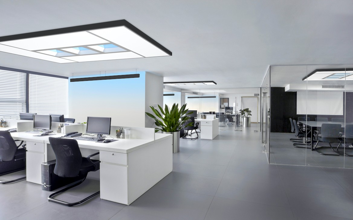 Werkplek kantoortuin wit verlichting